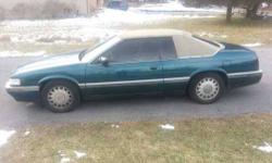1994 Cadillac Eldorado Coupe Bucket Seats Digital Instrument Panel Power Heated Mirrors Overhead Console Power Antenna Power Brakes Rear Window Defroster Tinted Glass 16 Inch Wheels 4.6L V8 DOHC 32V FI Engine Premium Unleaded Fuel Required 4 Speed