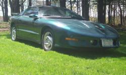 1994 Trans Am,25th anniversary year, Sleeper
V-8 5.7 LT1 engine,Automatic Trans.
T-Top
Dark Green, interior tan leather
Immaculate condition inside and out.
Well maintained...$9,000.00 Serious inquiries only-No tire kickers!!
Call and leave message or