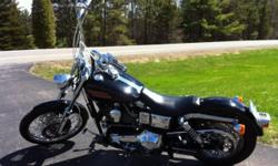 1996 Harley Davidson FXDL - 16,500 mi
1340cc
11.5" Progressive shocks
13" Carlini Gangster Apes handlebars with braided cables and internal wiring.
Lepera Bare bones seat
Vance & Hines Python II exhaust
OEM rigid mount saddlebags with liners
Semi pullback