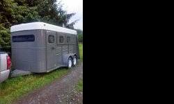 1996 Keifer Built horse/stock trailer. Recently sandblasted and painted. New electric run last fall and new tires 2 yrs ago (including spare) Has dressing room with bridle hooks and 3 tier saddle rack. Wood floor with thick rubber mats. I have 1 slant