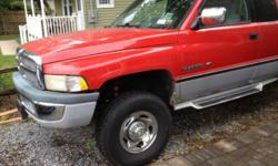 1997 Dodge Ram 2500 Base Extended Cab Pickup 2-Door 5.9L
Oversized tires, tonneau cover, 8 foot bed, tow hitch, clean interior, CD player, rear siding window, extended cab
8 foot bed and tonneau cover and bed liner
Motor has 100,000 miles on it/
