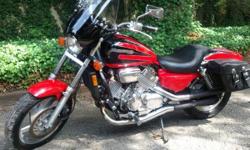 1997 Honda Magna VF750, with only 6,863 miles.
This Honda Magna 750 has been upgraded with a passenger backrest, luggage rack, Jardine exhaust, Mustang seat, highway pegs, and Mustang tank strap. Also front wind shield and new saddlebags. Also have brand