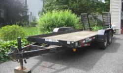 This is a real nice Custom brand 16 foot equipment trailer, two 6,000 Lbs. axels, two ramps, all lights work, wood deck in great shape, brakes also in good shape and tires are trailer tires with little wear. This trailer was used to move ATV's not abusive