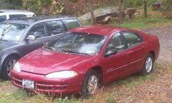 1998 Dodge Intrepid, 131,130 miles. Has been sitting since the summer but runs well. Repair records available. Would be a good station car - good gas mileage, AC works great.
Metallic red with immaculate beige velour interior, bucket seats, center