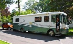 The motorhome listed here is a 36 foot 1998 Holiday Rambler Endeavor. It has a Cummins engine and Allison transmission. It has one slide out room, Corian countertops throughout. Tile floor in kitchen and bath. Microwave and stovetop. Dual Fuel fridge.
