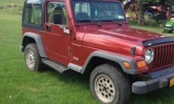 1998 Jeep Wrangler hard top. Had engine recently replaced with an engine that had 30,000 miles on it. Runs well.