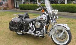 THIS ONE HAS TO BE SEEN!! ONLY 9,007 MILES!!!!
The bike is in better than excellent condition, and it has a few accessories. There is a set of chrome front axle covers, the front lights have chrome visors, an engine guard with highway pegs, a detachable