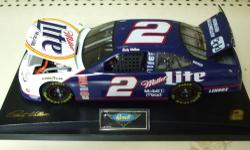1999 Rusty Wallace Miller Lite Ford Taurus 1:18 Die-cast Replica. 1 of 504 sequentially numbered Die-cast Replicas. Certificate of Authenticity Enclosed. New in factory packaging measuring about 12" in length. This is an adult collectable not intended for