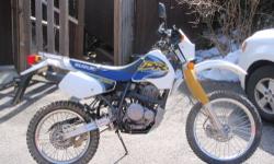 1999 suzuki dr 350e with 1900 original miles. The bike is very clean, starts at touch of the start button and runs just as good as it looks. The front tire is in great shape with about 60% tread left. The rear tire has about 30% tread left. It has an