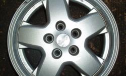 This is a takoff wheel with light scratches!
other jeep wheels available. www.hubcapnwheel.net