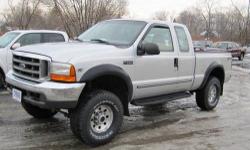 Up for your consideration this just in 2 owner Carfax certified no issue 2000 F350 XLT package , Lifted suspension, four brand new Grabber AT 2 315 75 R16 s just installed at our shop (1000) all new front brakes , calipers , and rotors recently installed,