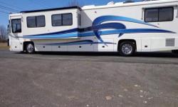 2000 Foretravel 40' Unicoach U320 with large driver side slide. Original MSRP $465,000. 106,373 Miles
Chassis Features: Foretravel monocoque chassis and superstructure, Cummins ISM-450 hp electronic diesel engine, Allison HD-4060R 6 speed transmission