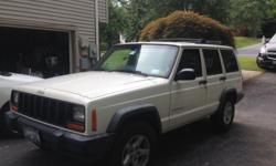 2000 jeep cherokee 4 wd , 4 dr , white well maintained runs great serviced and taken care of . clean title must sell!