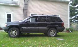2000 jeep grand cherokee 180k with all leather interior all power options,sunroof,needs nothing also interested in trades for a 4x4 truck of equal value has a rusty tank cover which I believe is removable. And a hole in the left driver side fender about