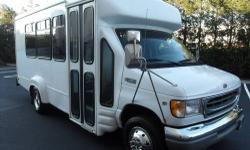 2001 Ford E-350 Shuttle Bus for 10 passengers plus driver. The 5.4L V-8 Triton gas motor runs perfectly with just 11K actual miles! This fiberglass shuttle bus looks great and will give excellent service! The automatic transmission shifts smoothly and