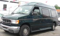 2001 FORD E150 ECONOLINE CONVERSION BRAND NEW TIRES 104K MILES WITH HOME APPLIANCES AS COOLER, TV, SHELVES, 4 FULL TURNING CAPTAIN CHAIRS, NICE WOOD GRAIN TRIM , RCA CABLES FOR NUMEROUS OF ELECTRONIC HOOK UPS, AND STEREO HEADPHONES TO KEEP PEACE AND QUIET