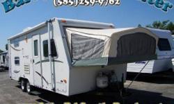 If you need a lighter camper but don't want to sacrifice space, then a hybrid camper is for you. This Kiwi has a dry weight of around 3,200 lbs so most larger SUV's or smaller trucks will tow it. It has everything you need inside, too; two bed pop-outs,