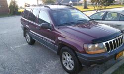 Looking to sell my 2001 Jeep Grand Cherokee Laredo to help with wedding expenses. It is a 6-Cyl vehicle with an automatic transmission. The back hatch was replaced, so it is a slightly different color than the rest of the car (the pictures won't upload