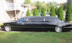 2001 black stretch town car limo 115000 miles just put in trans. need some body work seats 6 in the back