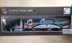 2002 Miami Dolphins Team Collectible by Fleer Collectible -- In original box
shipping additional