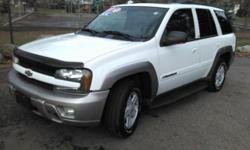 This 2003 Chevrolet TrailBlazer LTZ is clean inside and out, runs strong with its 6-Cyliner 4.2L VORTEC engine and gives all weather versatility with electronic 4-Wheel Drive. Comes with leather seating, CD stereo, power options, tinted windows and more!