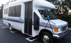 2004 FORD E-350 Startrans shuttle bus with 12 passenger capacity plus driver and 4 wheelchair positions. The low mileage 6.8L V-10 Triton gas motor was well maintained and is very powerful. This shuttle bus looks great and will give excellent service! The