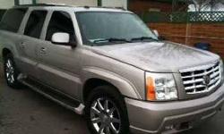 2004 Cadillac Escalade ESV This SUV currently has 96,140 miles and in great condition Platinum Grey Metallic exterior and with a premium Cream leather interior Equipped with a V8 automatic transmission with Overdrive technology Standard features include a