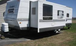 2004 Cherokee Travel Trailer 29F, sleeps 6 but because of large floor plan could def. sleep more. Excellent condition, VERY clean-looks brand new! This camper belongs to a non-smoking family, it has a huge slide-out w/sofa bed and dinette(w/large picture