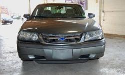 2004 Chevrolet Impala LS with LOW MILES!!! Under Limited Warranty. Call to schedule a test drive. Olympic Auto Group is a Family owned and operated Pre-Owned dealership. We are a proud member of the Better Business Bureau..... Extended warranties and