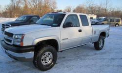 Up for your consideration this just in and super nice and clean 3 owner Autocheck certified no issue 2004 Silverado 2500 HD extended cab 4x4 , fully loaded with cloth bucket seating, power windows,locks,tilt steering and cruise control, factory uplevel
