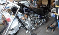 2004 PitBoss Chopper Super SideWinder
Black with Silver/Purple Graphics (ABSOLUTELY NO TEXT MESSAGES)
S & S 1584cc Engine
6 Speed Left Side Drive
Frame: Daytech NO TRADES!
Vance & Hines Short Shots Exhaust
Rake: 40 in the neck 3 in the trees
Front Tire: