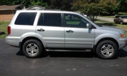 For sale is this 2004 Honda Pilot EXL with 106k miles. It is in excellent condition and runs like new. In addition to having all the features of an EXL it also has the extra options of DVD player, running boards, roof rack, and back-up sensors. This Pilot