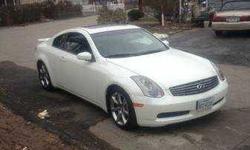 2004 Infiniti G35 Coupe Recently professionally painted 85,000 miles 5 speed automatic transmission V6 Exterior color is White with Black leather interior AM, FM single disc CD player Sun roofAlarm Keyless entry Alloy rims Cruise control Cargo net Front
