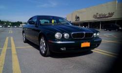 2004 Jaguar XJ
4.2L V8
85,000 miles
Awesome highway gas mileage.
Racing Green Paint, Tan Interior
All power everything
Heated seats all around
Integrated telephone
Air ride suspension all around
All aluminum body and frame so will never rust
Full size