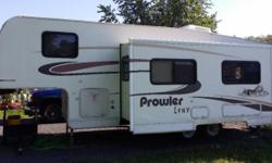 2004 Prowler 8275S Ultra Light aluminum frame, 27 foot fifth wheel camper with 13' slide. Sleeps 6, with pull out couch bed and dinette converts to a bed. Has electric/gas hot water heater, electric/gas refrigerator, gas furnace, electric ducted roof air