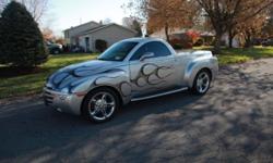 2005 Chevy SSR 390 HP 6.0 Liter Hard Top Convertible
Excellent Condition - 14,699 miles - Garage Kept - Original Owner
Factory Gauge Pod - Bose Premium Sound - Multi CD
Factory Running Boards - 20" Alloy Rims - Silver Base Paint
Extras Include: