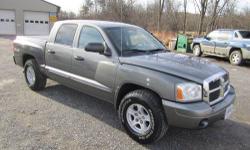 Up for your consideration this just in 2005 Dodge Dakota SLT Crew cab 4x4 Carfax certified 1 Owner, power Leather seating, remote keyless entry, power windows,locks,tilt steering and cruise control, factory CD player, aluminum wheels with super nice TA