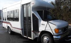 2005 Ford E-450 Fiberglass body 16 passenger plus driver shuttle bus. This well maintained bus has a rugged and dependable Triton 6.8L V-10 engine which delivers superb performance and power under load. The bus has just been detailed and is in very nice