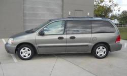 THIS 2005 FORD FREESTAR SE LOOKS AND RUNS BRAND NEW..MOST FUEL EFFICIENT MINI-VAN IN AMERICA....THE PAINT IS SILVER WITH GREEN TINT AND IS NEARLY FLAWLESS...THE INTERIOR IS ULTRA-CLEAN WITH NO TEARS...STOW-N-GO MODEL SEATS FOLD IN THE FLOOR...THIS VEHICLE