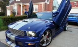 2005 FORD MUSTANG COBRA BODYKIT 300 HP...5SPEED MANUAL... CLEAN TITLE / CLEAN CARFAX / ORIGINAL MILES / MINT MINT / HOOKED UP... LAMBO DOORS, 20" RIMS, ALMOST BRAND NEW TIRES, COBRA BODY KIT, COBRA 5 SPEED TRANSMISSION AND SUSPENSION...AND TOO MUCH TO