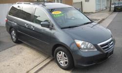 Royal Motors is happy to present this Low Mileage Honda Odyssey EX-L. We'll have you wishing your commute never ends! The rich Gray Exterior and the Gray Leather Interior finish gives this Minivan a sleek and sophisticated look. Drive this Pre-owned
