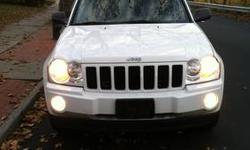 white 2005 jeep grand Cherokee 115k miles pioneer navigation, sunroof, leather headed seats 4x4 4.7L v8 very clean car, heat a/c work no check engine light just got a full tune-up on the car filter oils spark plugs please call chris 347-500-1342