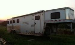 I purchased this trailer new in the spring 2006. LQ has 9 short wall. Dinette folds into bed with storage under seats. Fridge, microwave, stove-top and sink in kitchen. Seperate bathroom with shower, toilet and plenty of coset space. Pass-through to stud