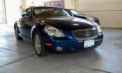 One Owner 2005 Lexus SC 430 convertible under Limited Warranty. LOW MILES!!! Leather Heated Seats, Memory Seats, Navigation System, Factory Retractable Hard Top, Power Seats and much more. Call to schedule a test drive. Olympic Auto Group is a Family