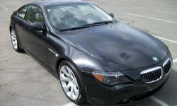 Imagine This BMW 650i In Your Garage.. 6-Speed Automatic Steptronic Transmission. Yes Navigation Is In Here along With All The Luxury Option You Want !!!--Best Color Combination-- Black Sapphire Metallic Cream Beige Leather A Rare Model In A 2 Door..