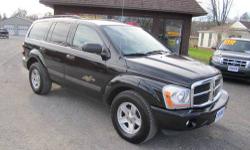 Up for your consideration this just in and in very nice condition 2 owner Carfax certified with no issues 06 Durango SLT with dodges mighty 4.7 magnum V8 engine with smooth shifting automatic transmission, comes fully loaded with power leather front