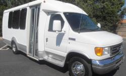 2006 Ford Starcraft E-350 15 seat Non-CDL gas shuttle bus with luggage compartment including a co-pilot seat for sale! It comes equipped with the powerful and durable gas 6.8L V-10 Triton gas engine and 5 speed, smooth shifting automatic transmission with