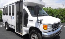 FORD E-350 wheelchair mini shuttle bus with 10 passenger capacity plus driver and up to 4 wheelchair positions. The low mileage 5.4L V-8 Triton gas motor was well maintained and is fuel efficient. This shuttle bus looks great and will give excellent