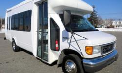 Excellent condition 2006 Ford E-450 Startrans fiberglass body 12 + 2 wheelchair passenger plus driver shuttle bus. This beautifully well maintained bus has a rugged and dependable low mileage Triton 6.8L V-10 engine which delivers superb performance and