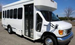 2006 Ford E-450 14 passenger plus driver shuttle bus. This well maintained bus has a rugged and dependable Triton 6.8L V-10 engine which delivers superb performance and power under load. This engine is known for it's power and low maintenance! The bus is